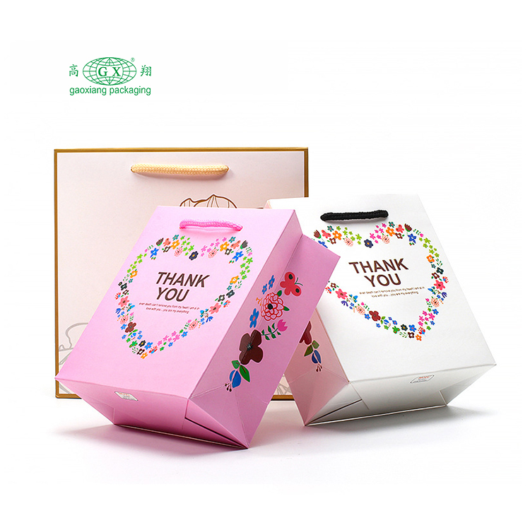 공장 사용자 정의 로고 bolsas de papel 고급 선물 포장 가방 재사용 가능한 종이 쇼핑백