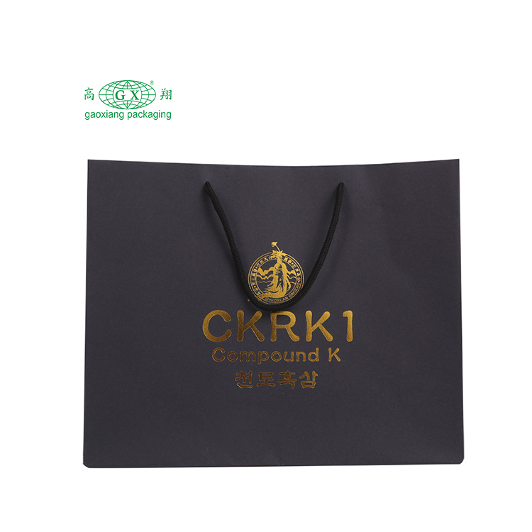 Eco 친절한 주문 로고 선물은 금 리본을 가진 광택이 없는 박판으로 만들어진 부티크 개인 상표 우아한 종이 봉지를 자루에 넣습니다